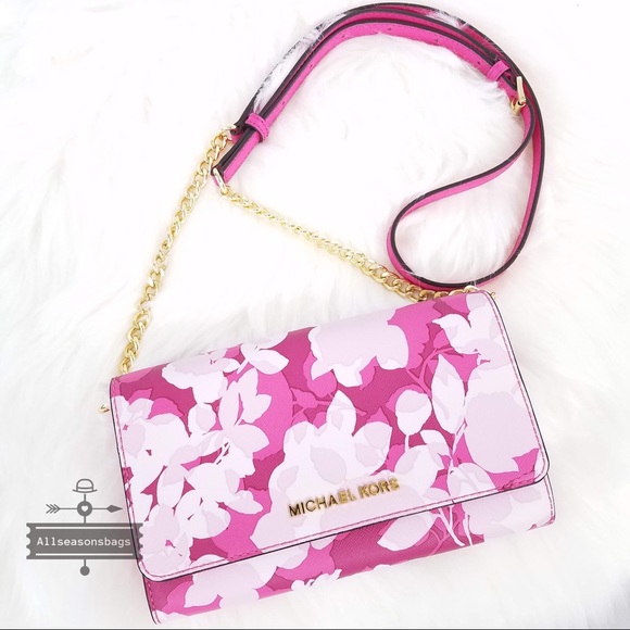 Michael Kors Handbags - NWT Michael Kors Jet set granita pink crossbody